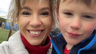 tajina and her son smile at park