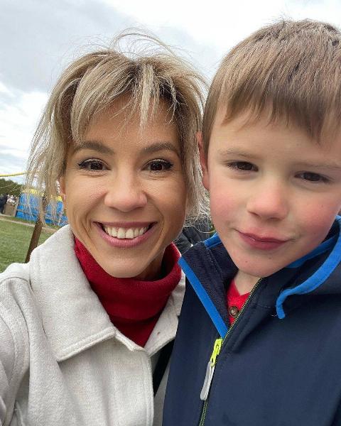 tajina and her son smile at park