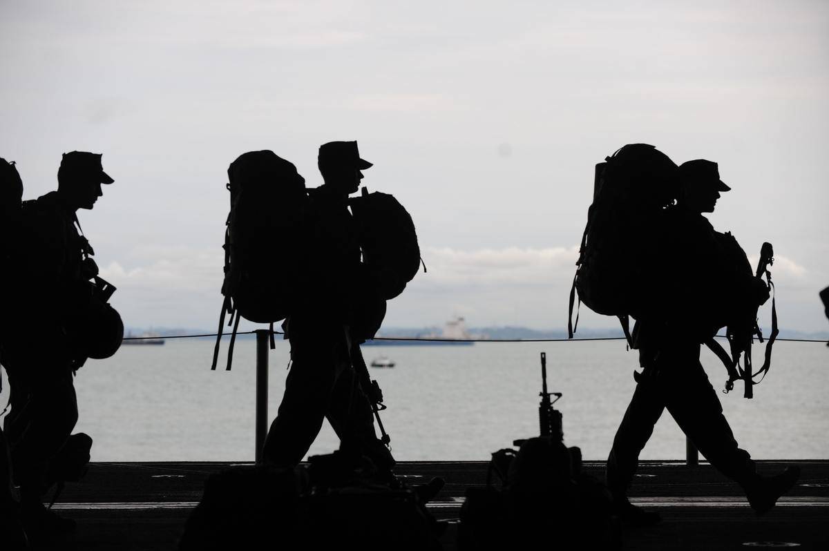 silhouette-of-soldiers-walking