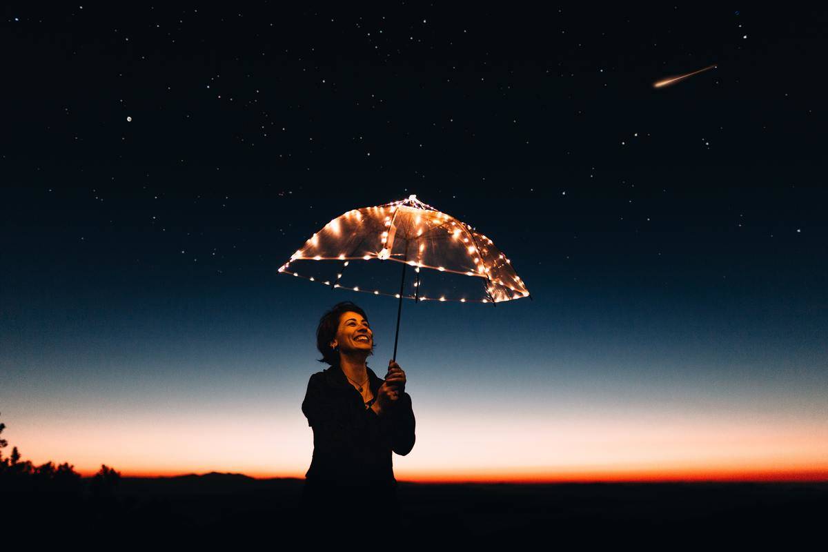 woman-using-umbrella-with-lights