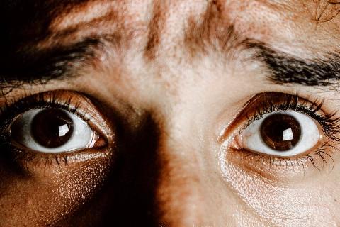 extreme-close-up-photo-of-frightened-eyes