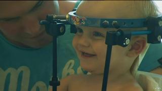 Jaxon smiling with his halo on.