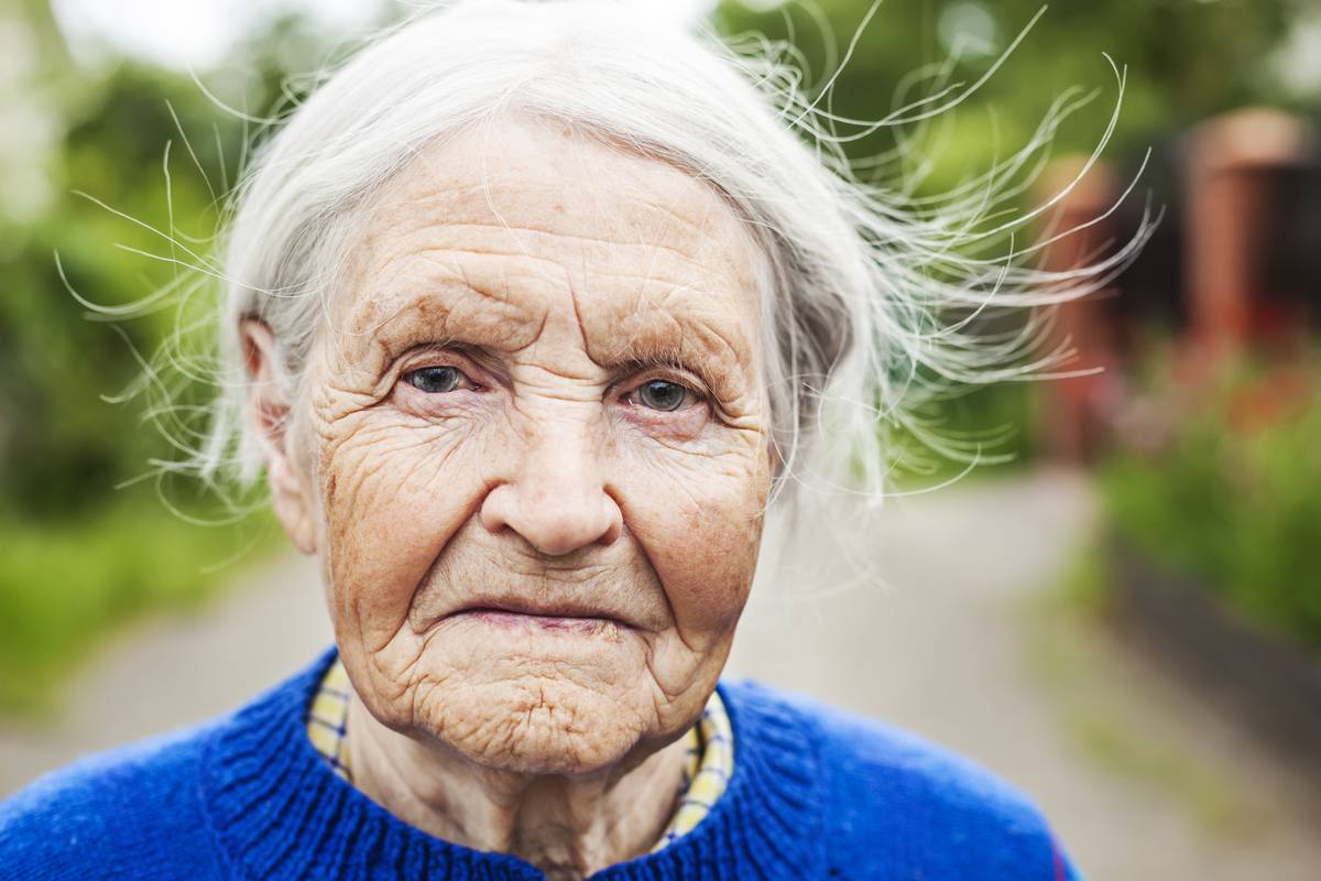 A closeup of an elderly woman's face.