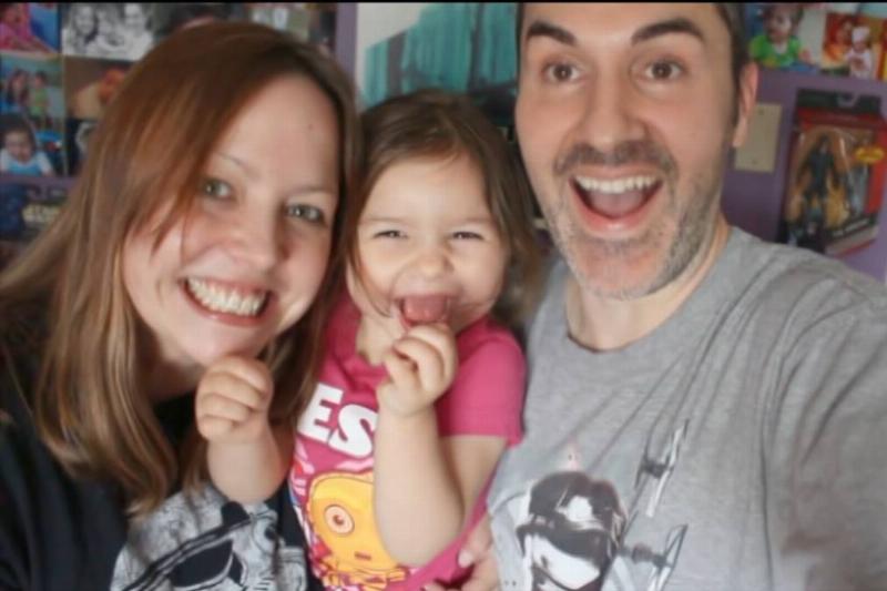 A screenshot of Ever with her parents from a video on her family's vlogging account.