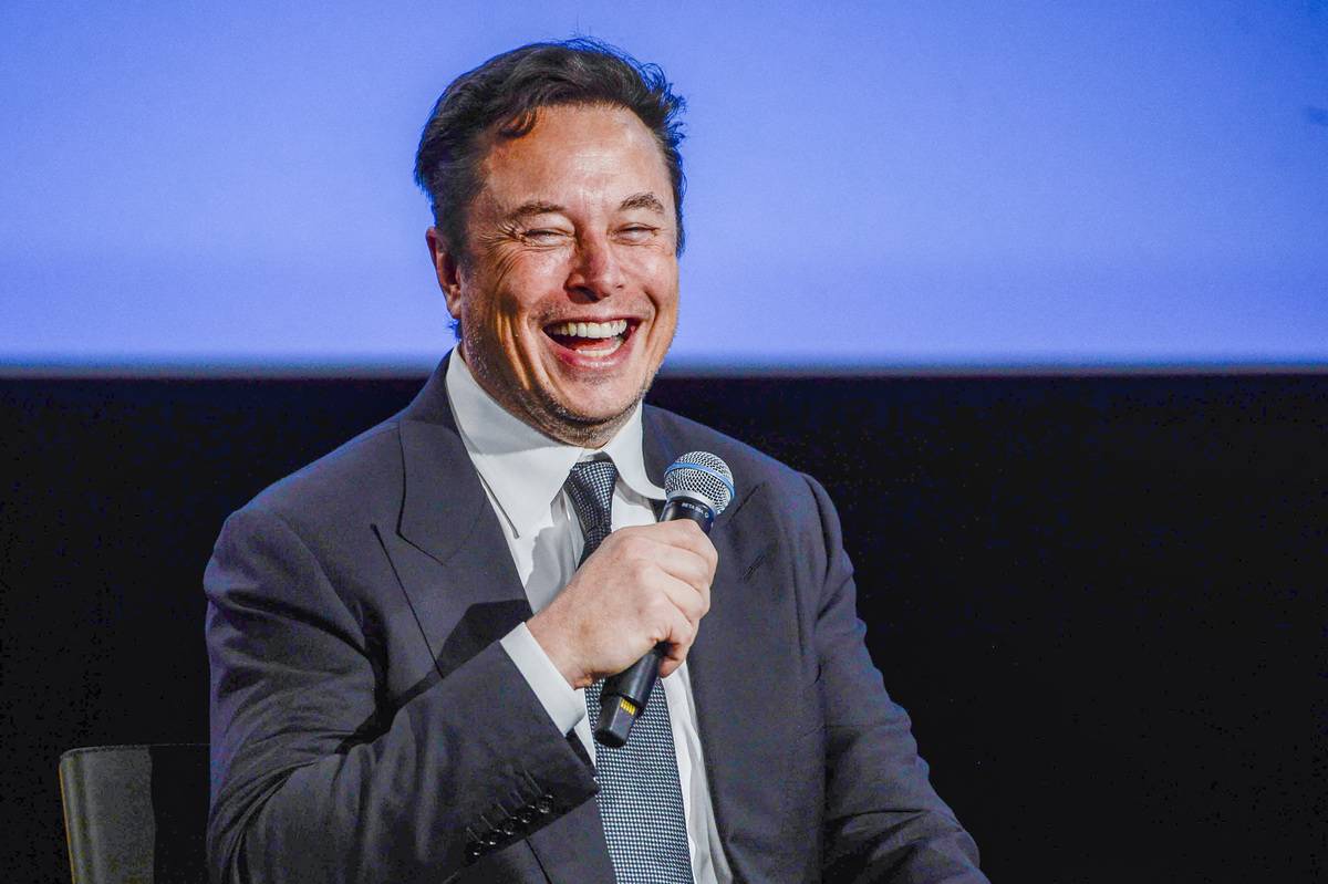 Tesla CEO Elon Musk smiles as he addresses guests at the Offshore Northern Seas 2022 (ONS) meeting in Stavanger, Norway on August 29, 2022.
