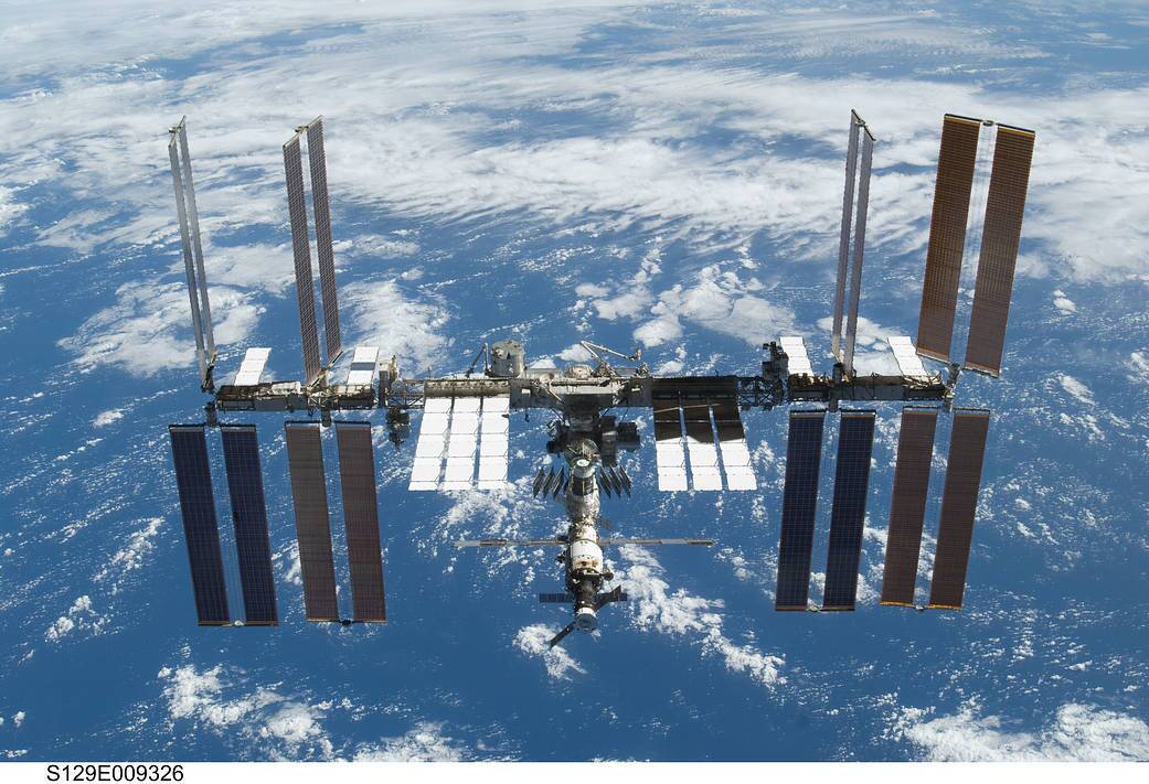 A NASA image of the ISS above Earth.