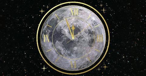 The moon superimposed on top a starry sky with a clock graphic covering it.