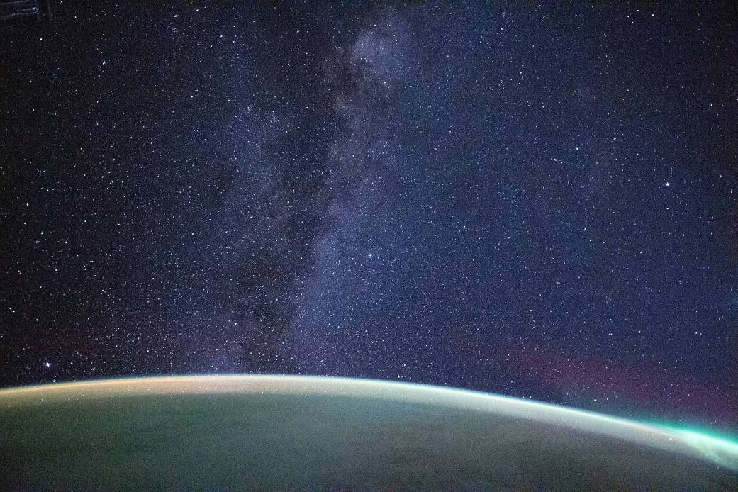 A long exposure photograph of the Milky Way formation above Earth as seen from the ISS.