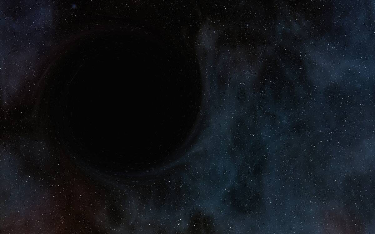 A near-dark image of a starfield with a large black space on the left side.
