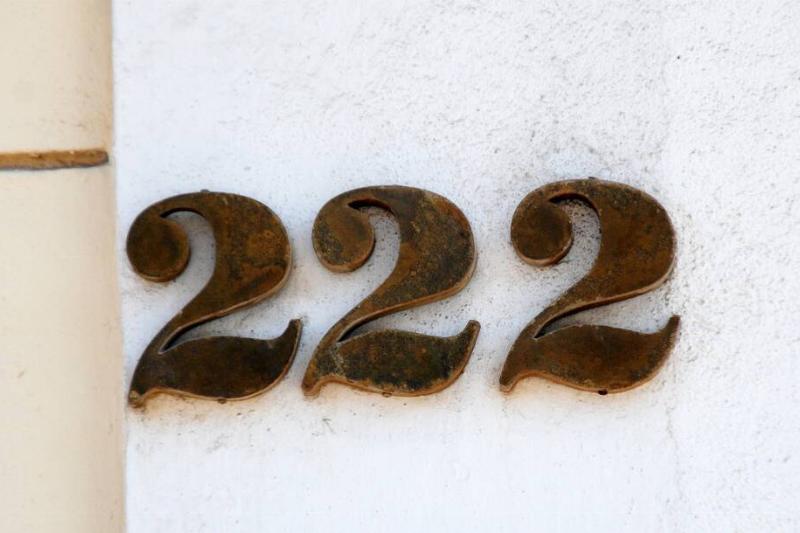 222 house number on wall