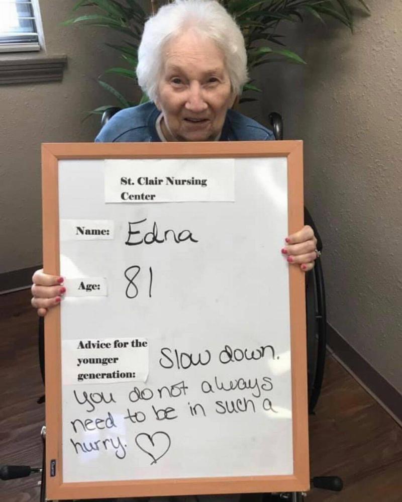 Edna holding her sign.