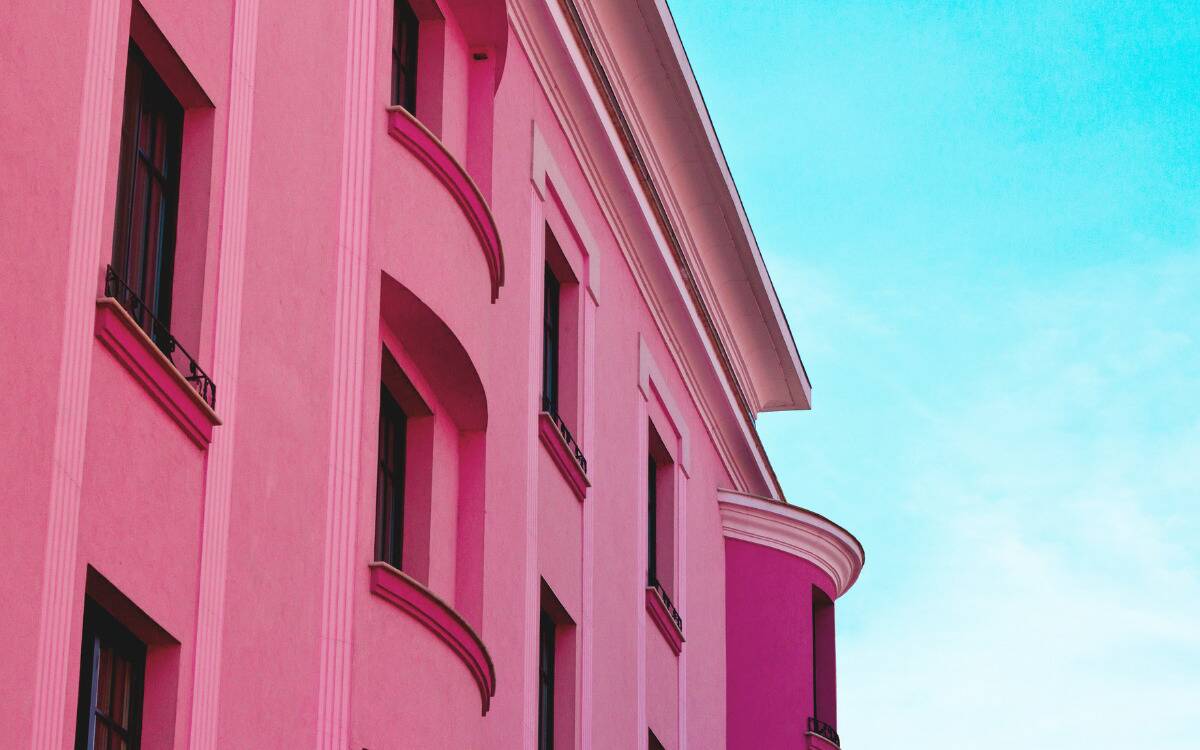 A bright pink building exterior.