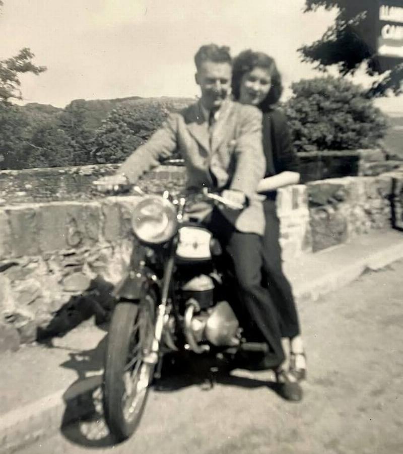 A photo of Morris in her youth also on the back of a motorcycle.
