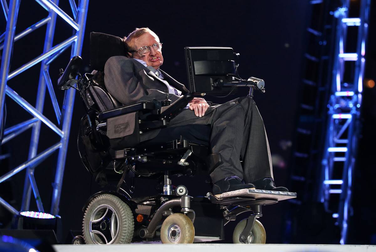 Stephen Hawking in his chair on stage at the 2012 London Paralympics.