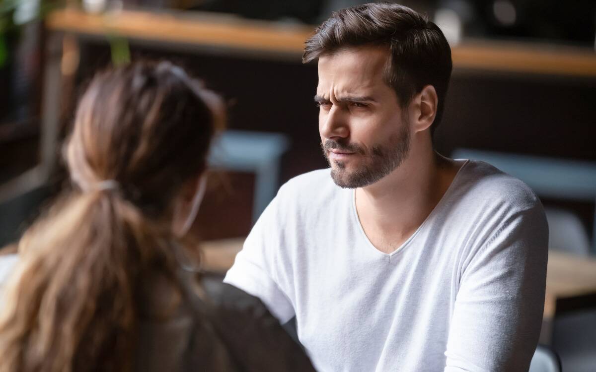 A man looking confused during a date.