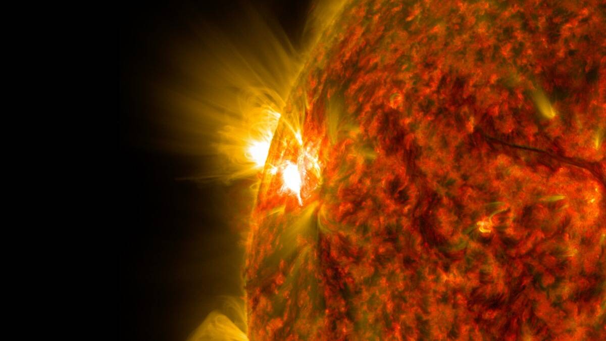 A solar flare on the sun's surface.