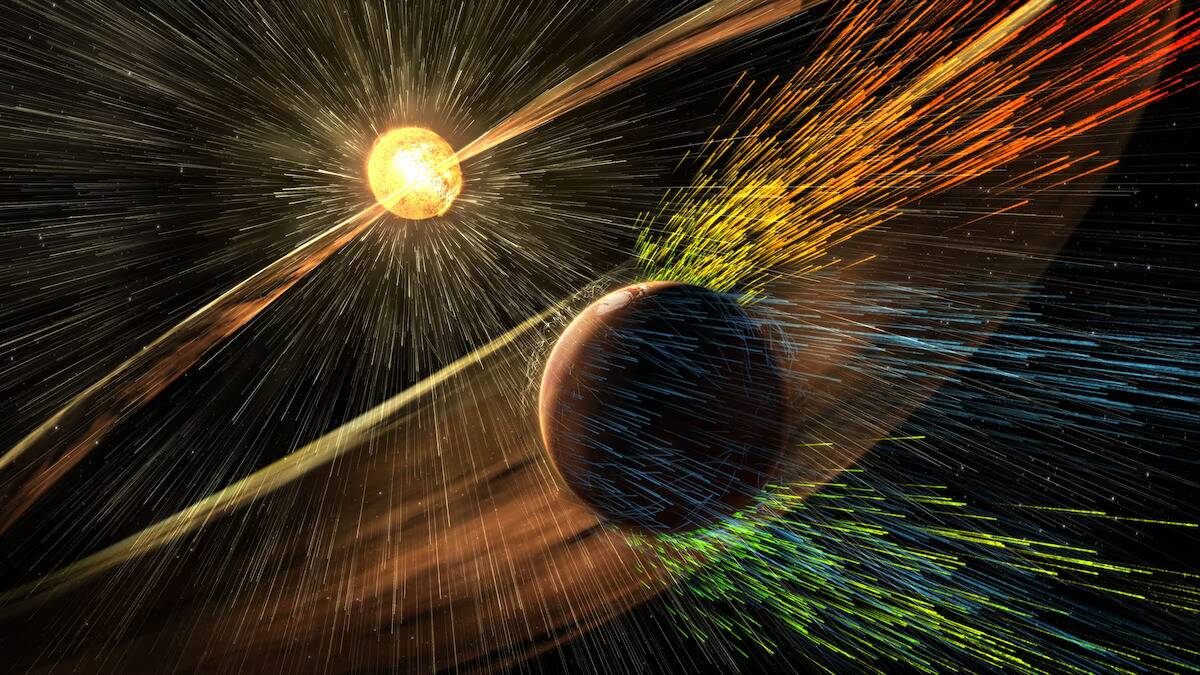 An artist's rendering of a solar storm hitting the planet Mars and stripping ions from the planet's upper atmosphere.