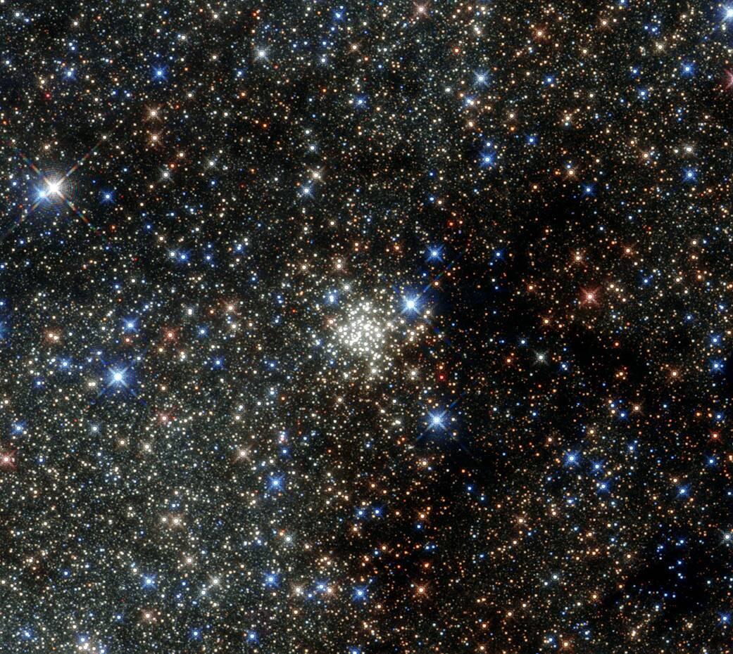 Hubble Space Telescope image of the Arches Cluster, the densest known star cluster in the Milky Way.