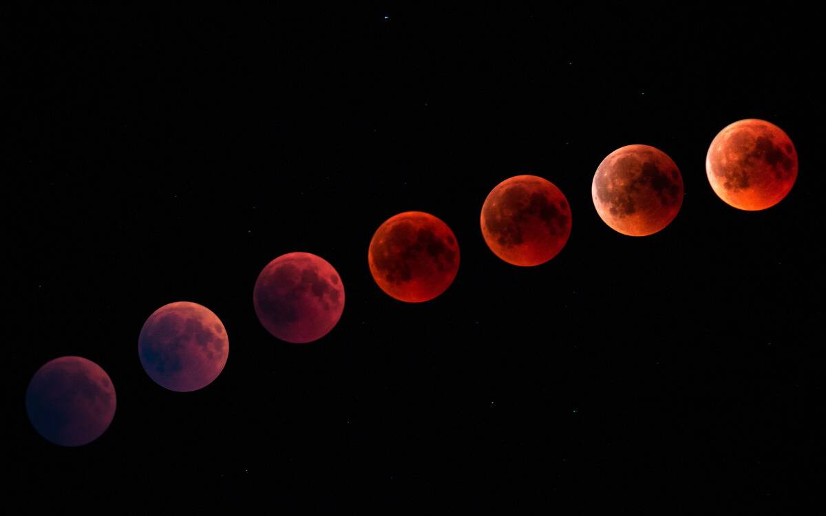 Multiple shots of the moon traveling through the sky, all shown in red.