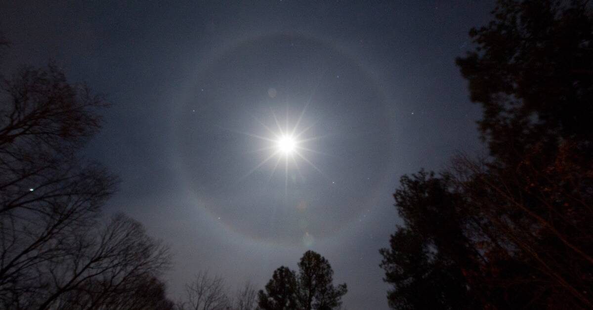 What does a moon halo signify?