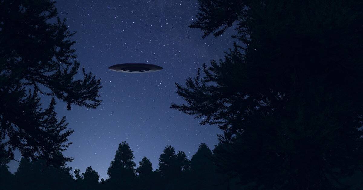 A render of a UFO hovering in the night sky.