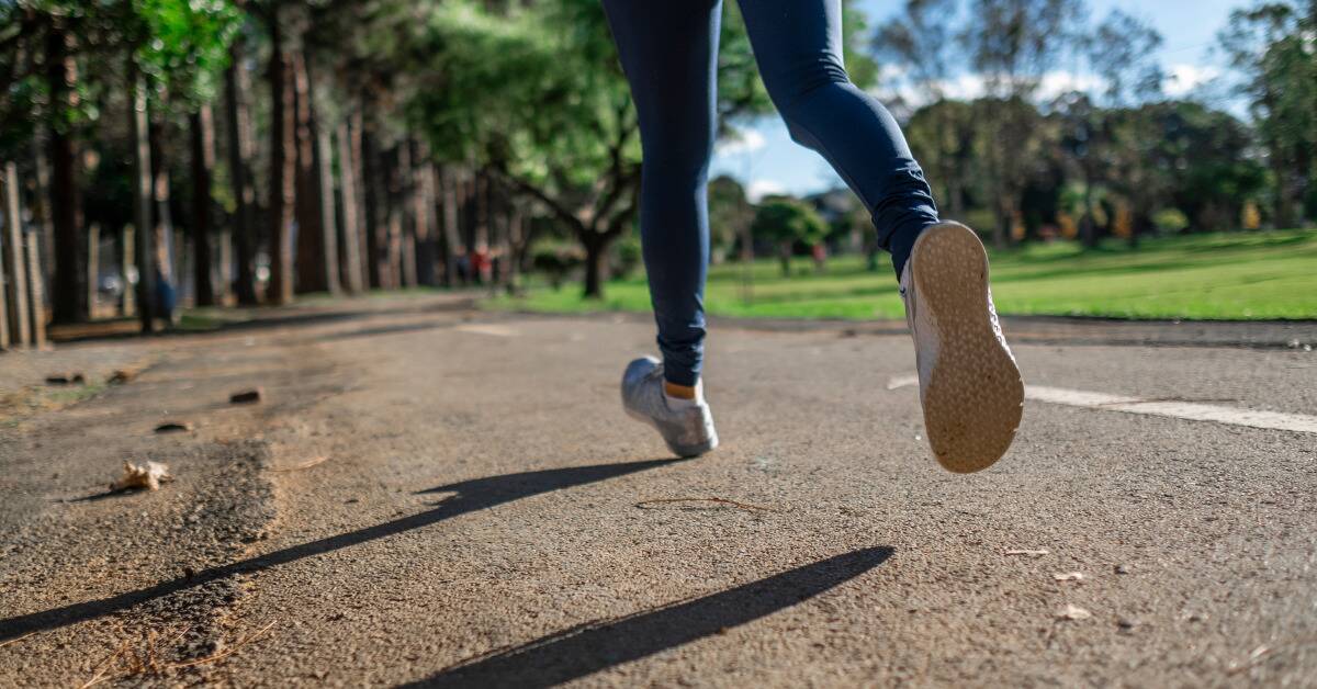 A shot of someone's legs as they run away from the camera.