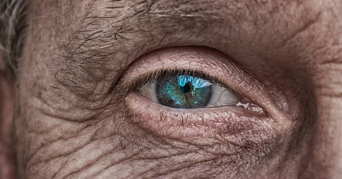A closeup of an elderly person's eye.