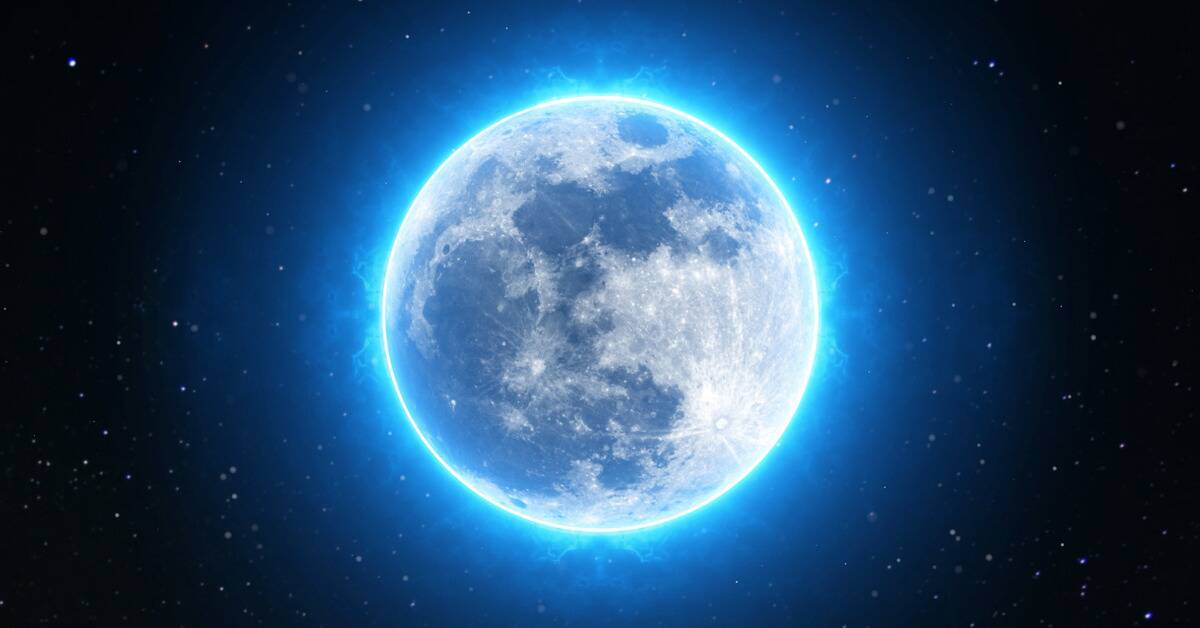 A full moon in the sky surrounded by a glowing blue aura.