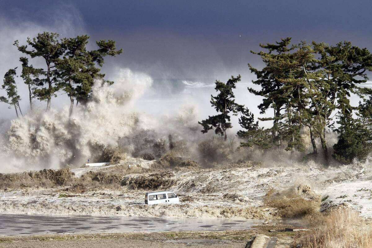 Tsunami waves hitting the coast of Minamisoma in Fukushima prefecture in 2011.