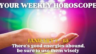 A hand holding a colorful, rainbow light of magic. There's text on screen that reads, 