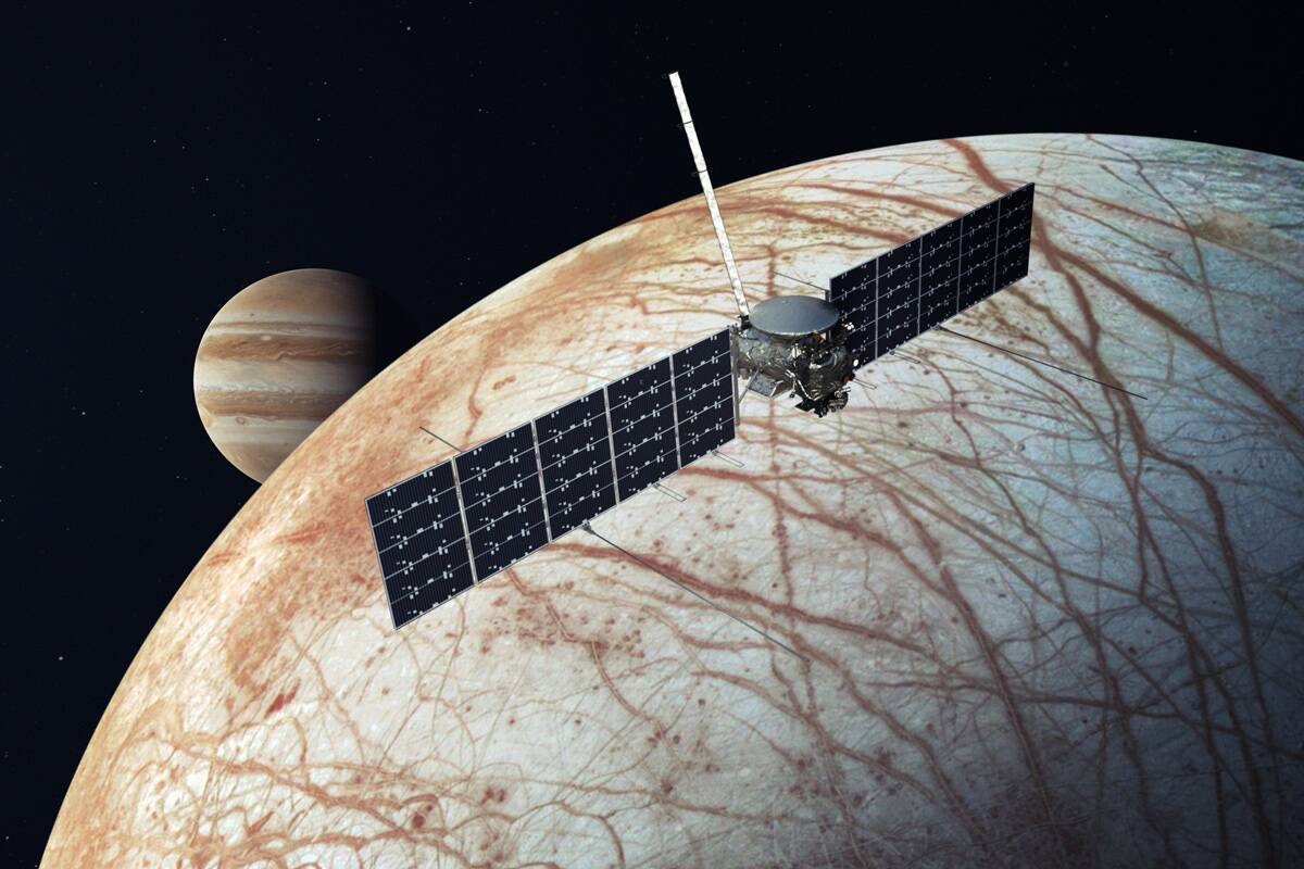 A render of the Europa Clipper flying above the surface of Europa.
