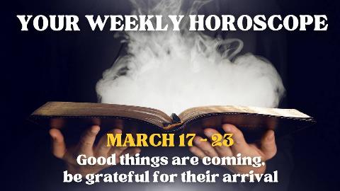 Someone holding an open book with smoke pouring out of it. There's text that reads, 