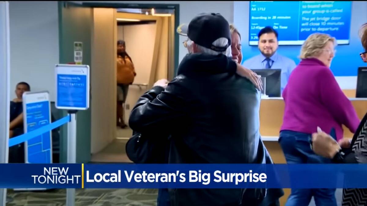 Barnes and Robles meeting at the airport, sharing their first hug.