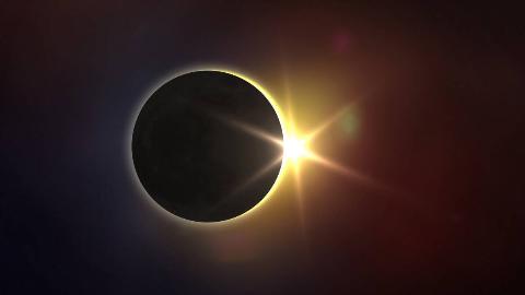 A render of a solar eclipse, a star-shaped glare on the right side.