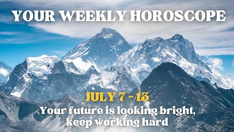 A mountain range against a bright blue sky. There's text on top that reads, 