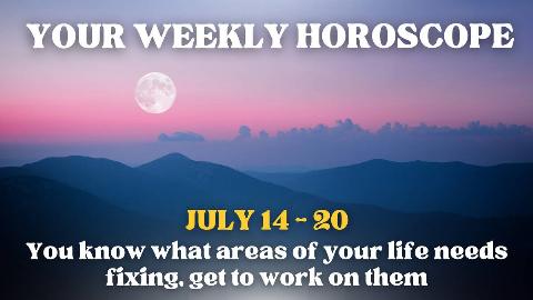 A hill range in shadow under the light of the moon in a pink and purple sky. There's text that reads, 