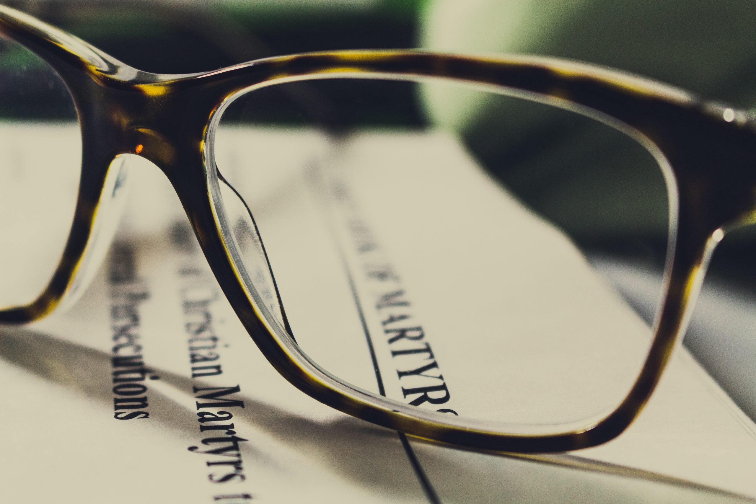 A closeup of a pair of glasses.