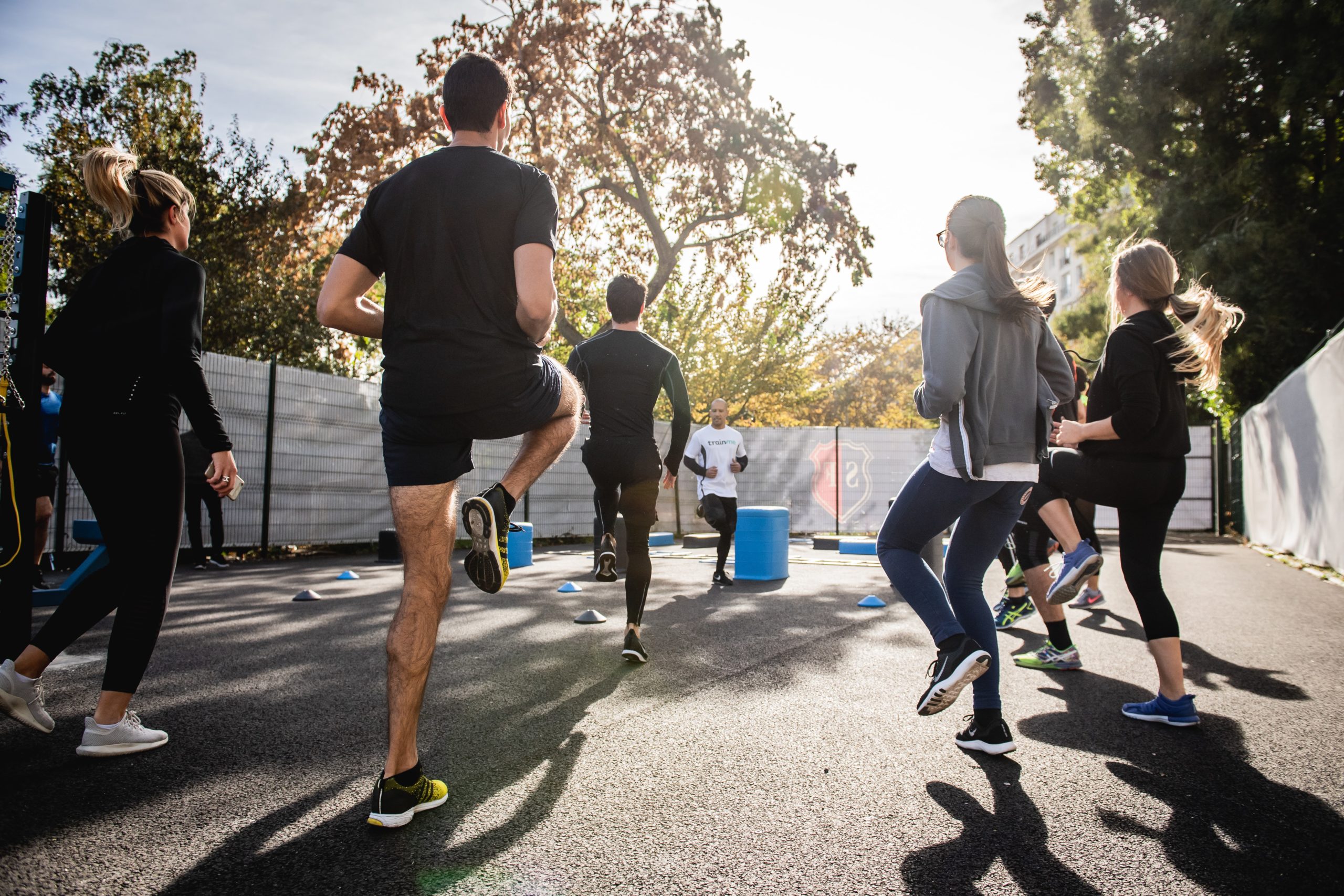 A group workout sessions happening outside.