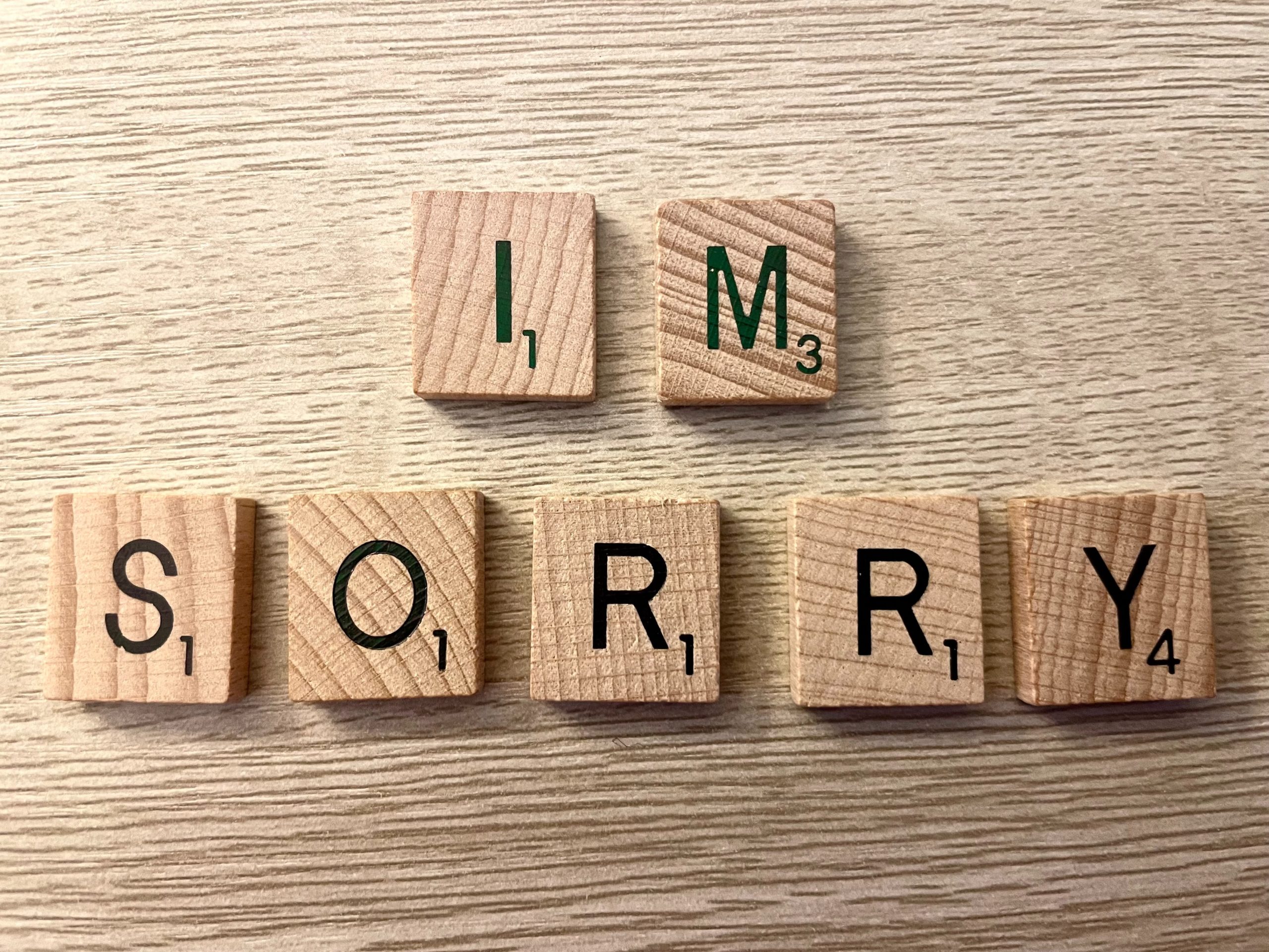 'I'm Sorry' spelled out in scrabble tiles.