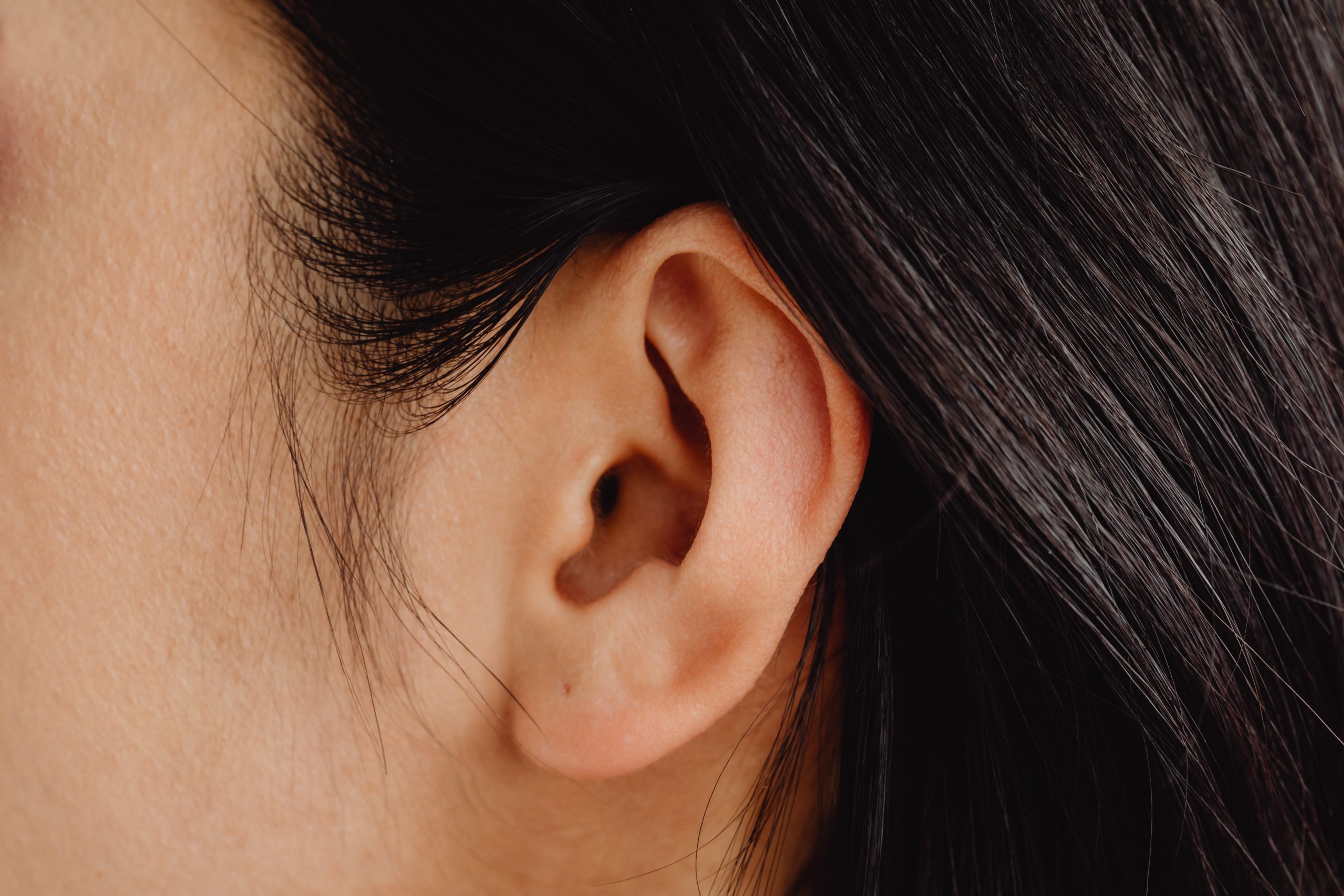 A closeup of a woman's ear.