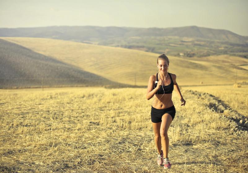 woman running in a field