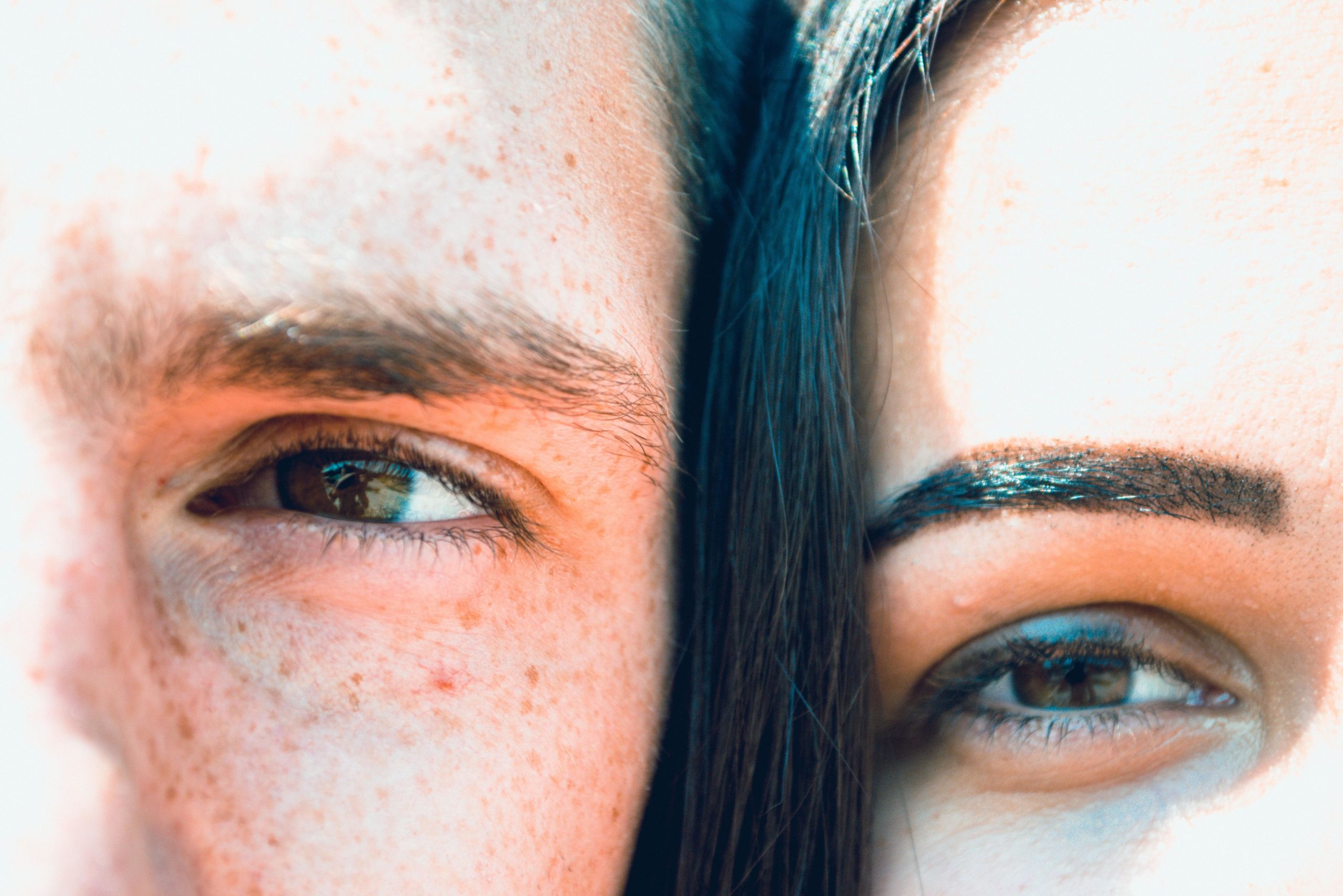close up of eyes of woman and man