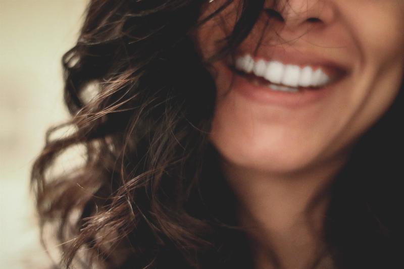 woman smiling with her teeth in a close up