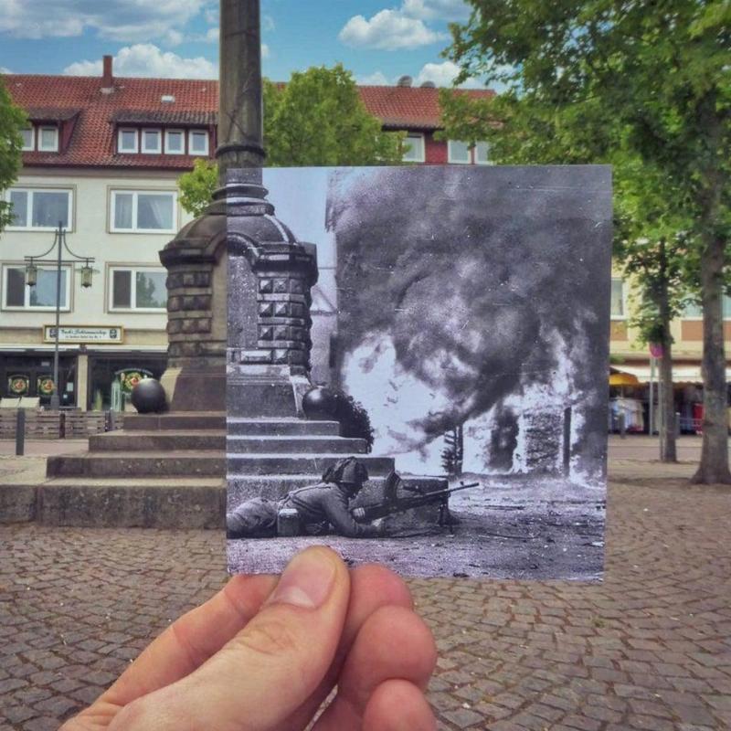 black and white photo of Germany  in 1945 held over the same location in 2021