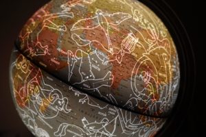 zodiacs drawn on a globe