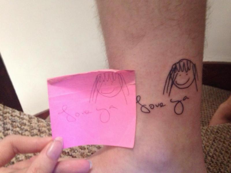 sticky note of mom drawing tattoed on ankle