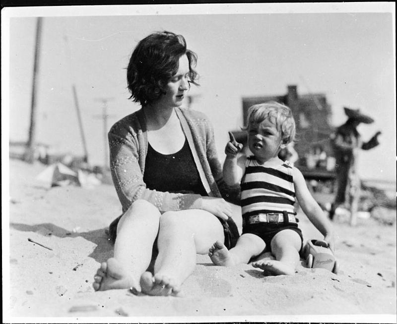 Norma Jeane Baker, future film star Marilyn Monroe (1926 - 1962), on the beach as a toddler with her mother Gladys Baker, circa 1929