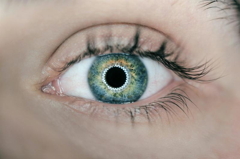 close up of blue eye dialated