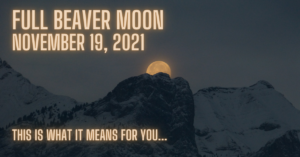 full beaver moon text over orange moon hiding behind hill image