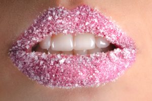 close up of lips full of sugar